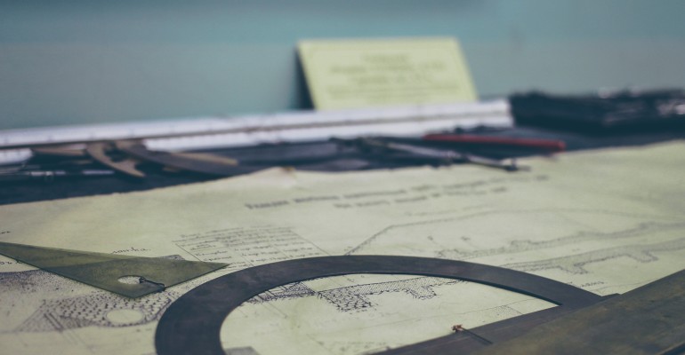 A drafting board and tools